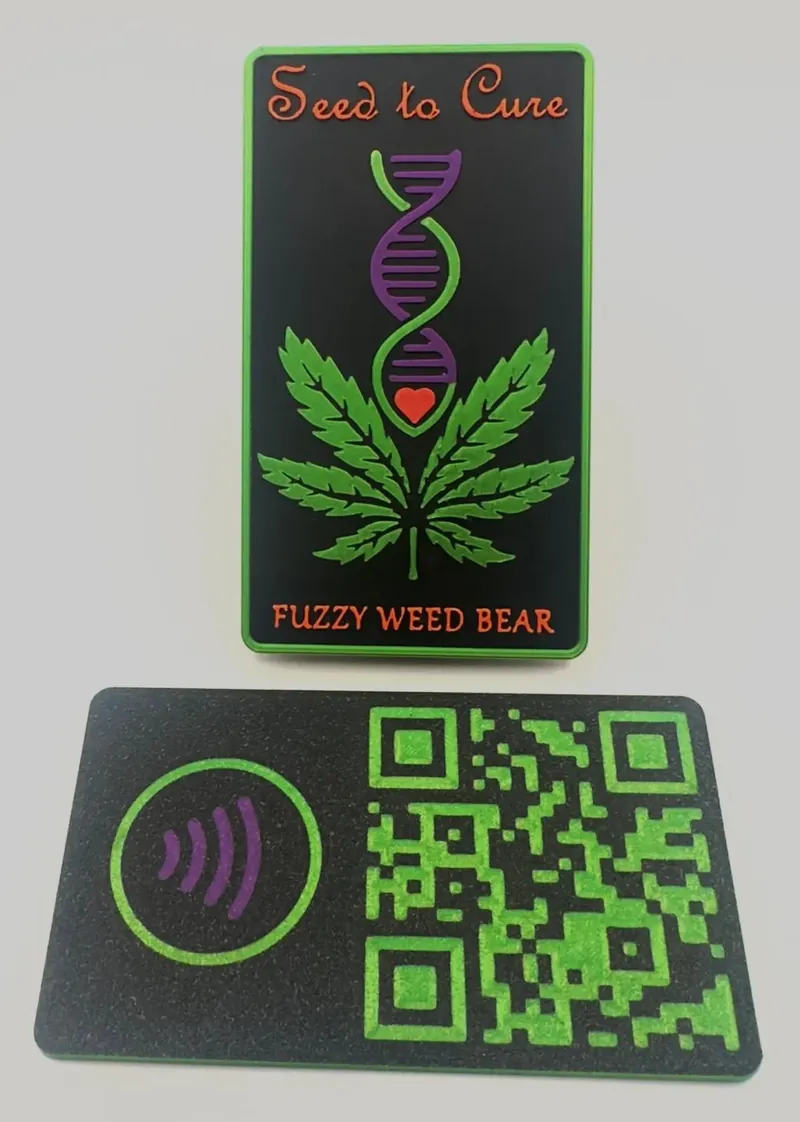 Two 3D printed cards: one with 'Seed to Cure' and 'Fuzzy Weed Bear' over a DNA-helix-and-cannabis-leaf motif, the other a green QR code with a contactless-payment symbol.