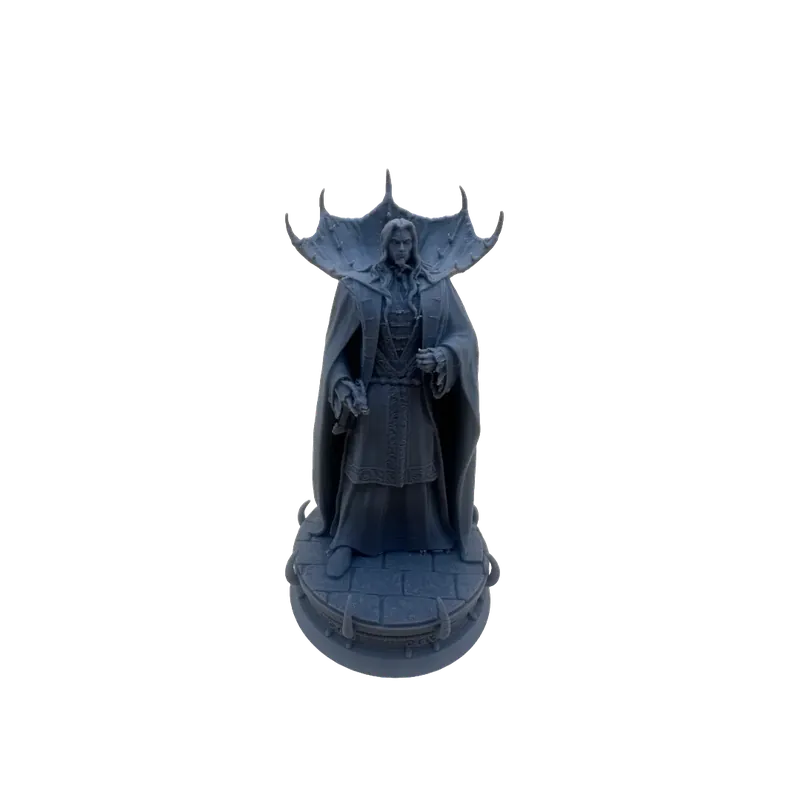 Gray unpainted miniature, printed by us in resin, of a robed sorcerer figure with a large spiked collar, on a round cobblestone base.